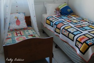 two beds with mama quilts
